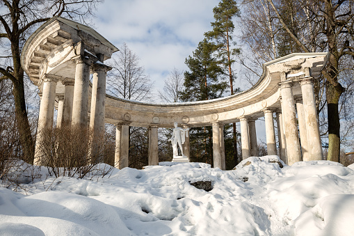 St. Petersburg, Russia - February, 2022: Apollo colonnade in winter Pavlovsk park