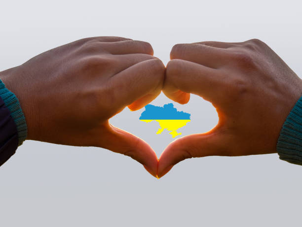Hand heart with Ukraine map