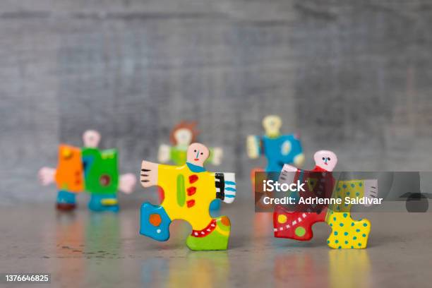 Hand Painted Jigsaw Puzzle Piece Figures Stock Photo - Download Image Now - Creativity, Design, Fashion