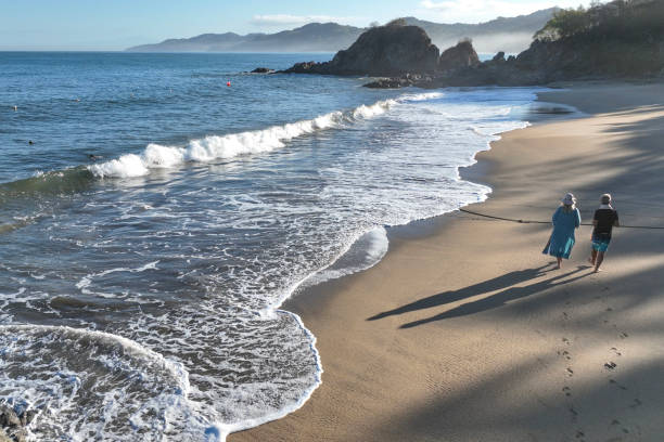 They look off towards Pacific Ocean