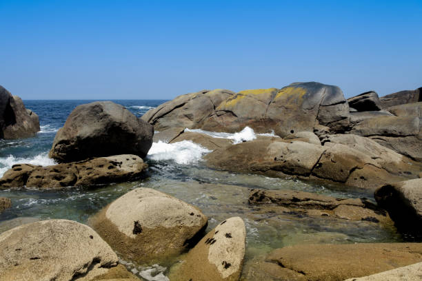 istock Stones and waves on the Costa da Morte 1376678649
