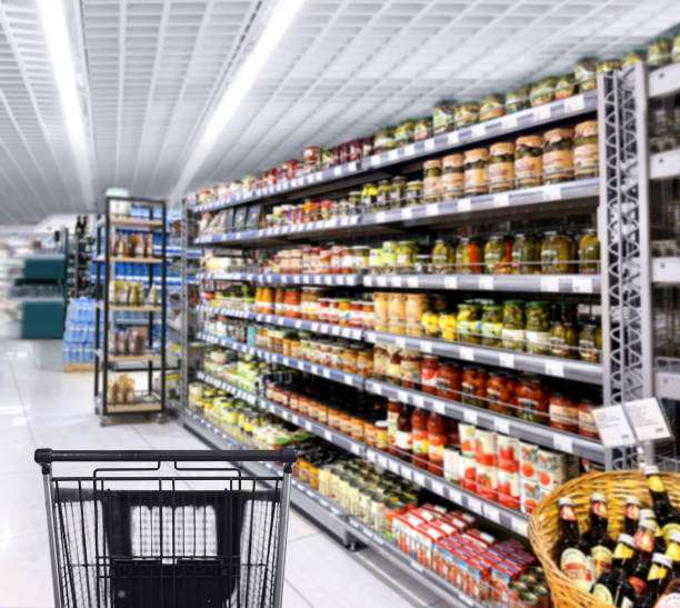 istock empty grocery cart in an empty supermarket 1376700293