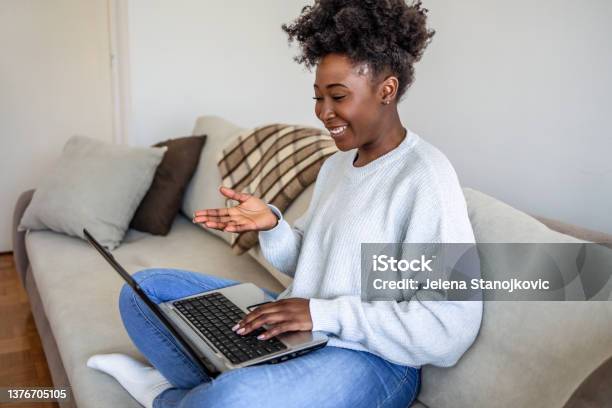 Africanamerican Woman Working At Home Due To Pandemic Isolation Stock Photo - Download Image Now