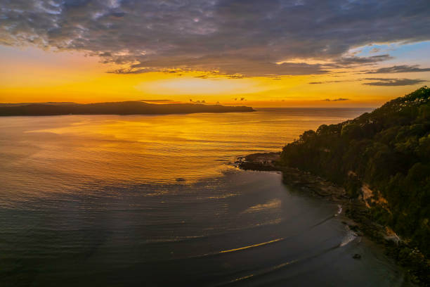 istock Aerial sunrise seascape with  low clouds 1376706694