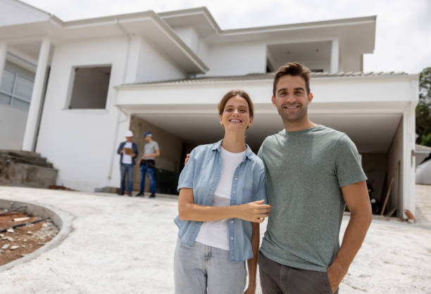 istock Happy couple building their dream house 1376721539