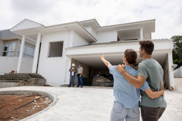 istock Happy couple building their dream house 1376721545