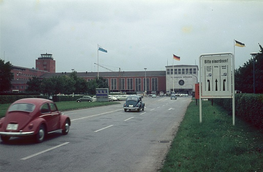 Munich, Bavaria, Germany, 1964. The old Munich-Riem Airport. Also: cars.