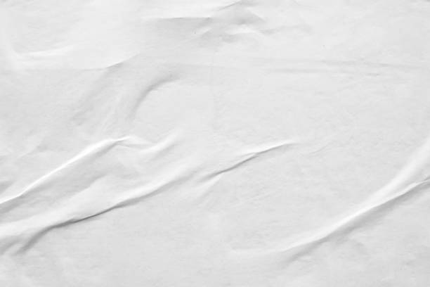 istock white crumpled and creased paper poster texture background 1376829527
