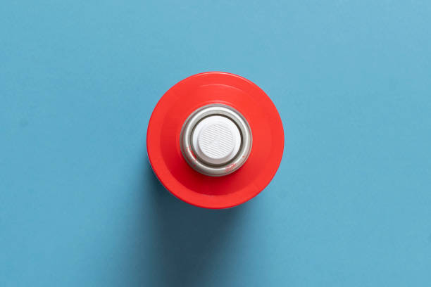 single simple spray paint can isolated on colorful background
