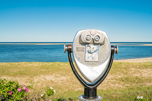 Coin-operated binoculars located on Bailey Island on the Maine Coast.