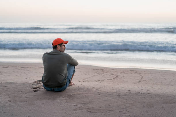 Man enjoying the view on the tropical ocean/sea. Summer concept.