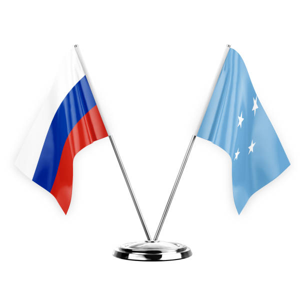istock Two table flags isolated on white background 3d illustration, russia and micronesia 1377016345