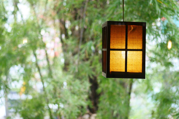 istock a glowing lamp in a nature with copy space 1377020640