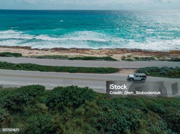 Aerial View Of Car On Road On Cozumel Island Near Playa Del Carmen At Sunset Stock Photo - Download Image Now