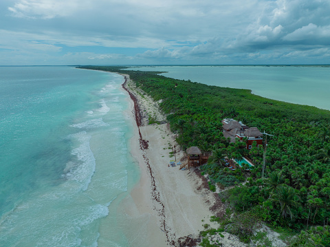 Scenic aerial  view of Sian Kaʼan Biosphere Reserve beach at sunset, Quintana Roo