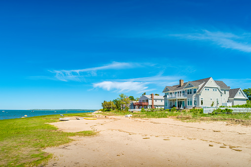 Beach houses in Barnstable, Cape Cod, Massachusetts, USA on a sunny day.