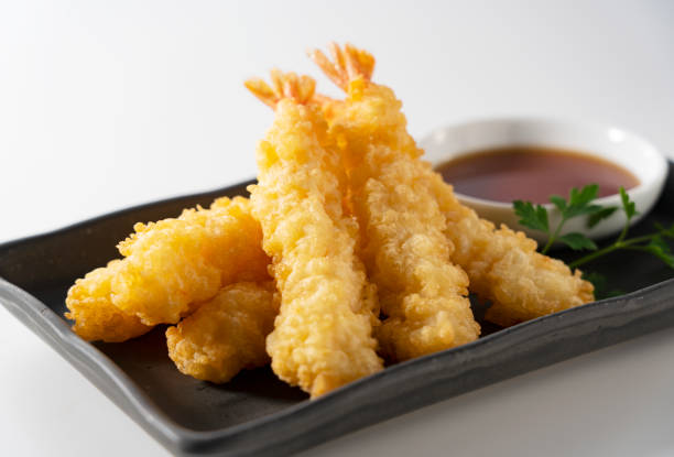 istock Shrimp tempura on a plate placed on a white background. 1377103604