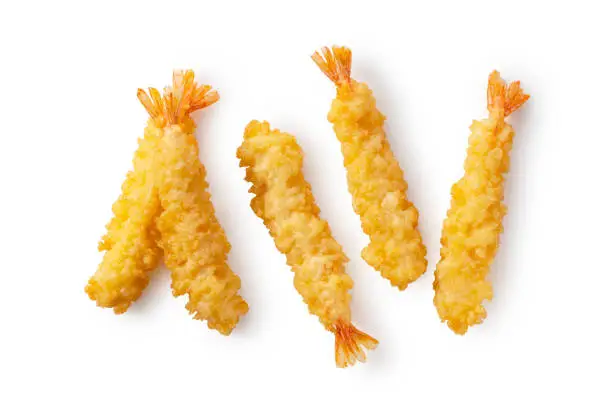 Shrimp tempura placed on a white background. Tempura is a Japanese food. It is Japanese fried shrimp. View from above