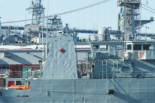 A Canadian Navy ship is docked for repairs/maintenance.