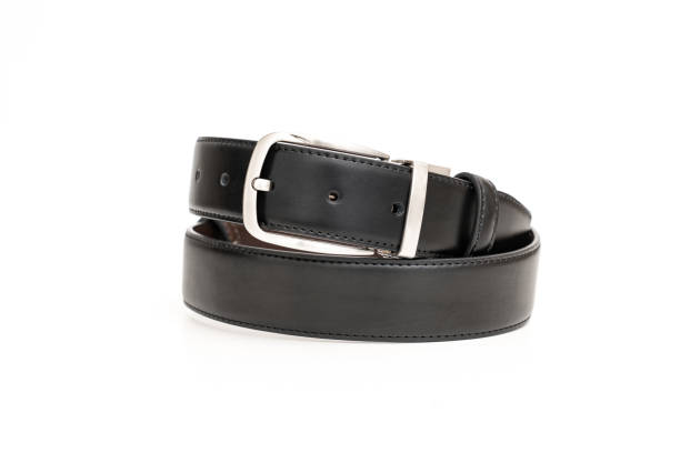 istock Double-sided black and brown leather belt with an unbuttoned buckle on a white. 1377142034