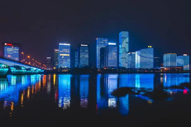 skyline of Taijiang istrict of fuzhou at night by Min River