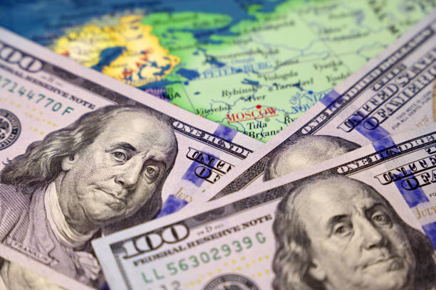 US dollars on map of Russia Concept of USA sanctions against the Russian economy 2022 russian invasion of ukraine stock pictures, royalty-free photos & images