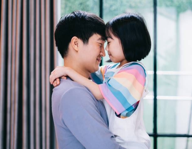 istock Asian father and daughter at home 1377225472