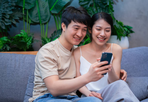 istock Young Asian couple at home 1377231886