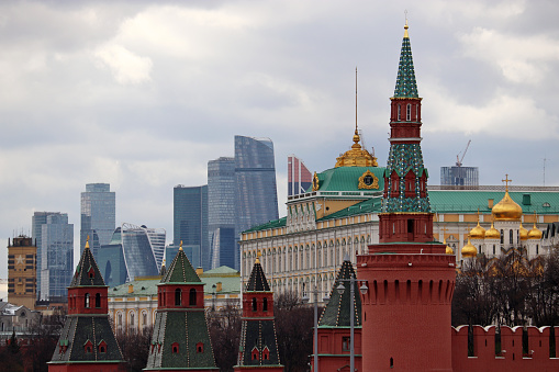 Kremlin towers in Moscow on cloudy sky background