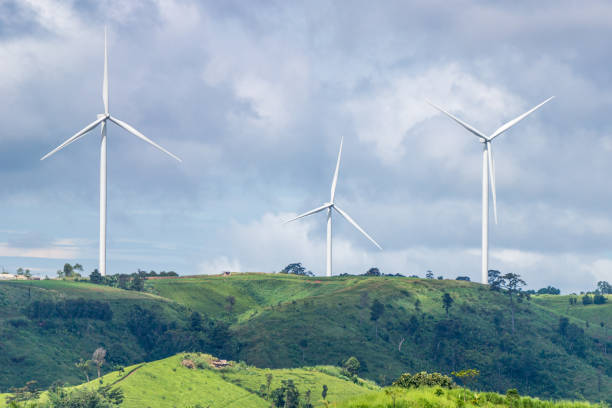 istock Three wind turbines farm on mountain in rural area 1377237779