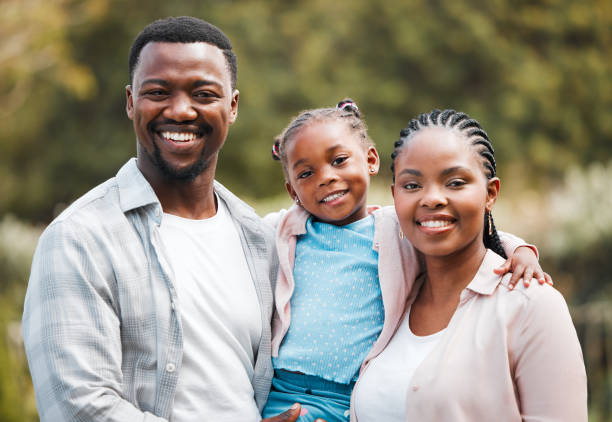 Shot of a young family spending time together in their garden What a beautiful family african descent family stock pictures, royalty-free photos & images