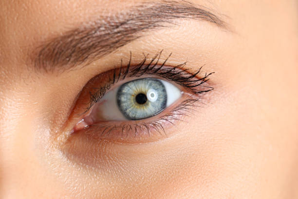istock Amazing female blue and green colored eye 1377265960