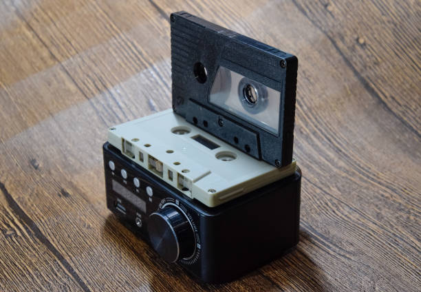 istock Audio cassette next to the amplifier on the table 1377299331