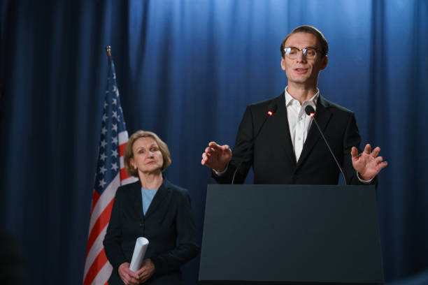 istock Young gesturing politician during the speech at the debate 1377312305