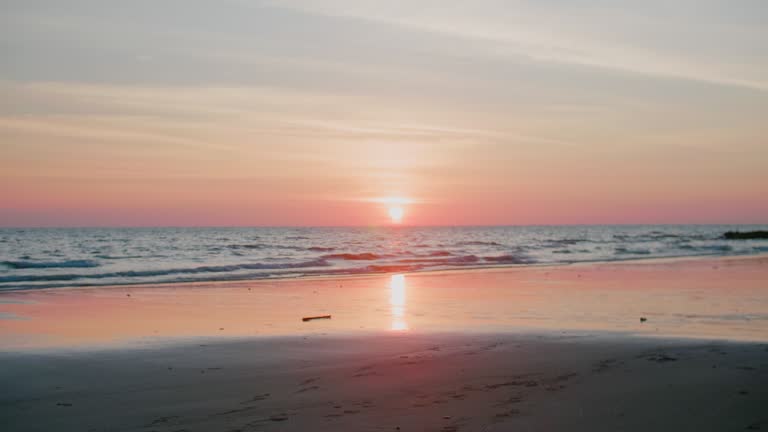 Beach With Sun Reflection At Sunset