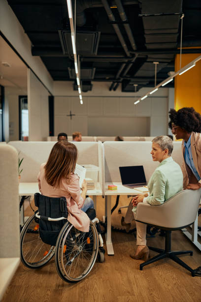 istock Diverse colleagues hanging in the office 1377344327