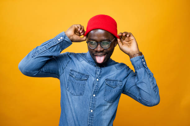 istock Handsome African American male model posing in a professional studio 1377408540