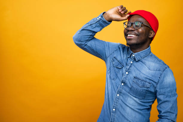 istock Handsome African American male model posing in a professional studio 1377408567