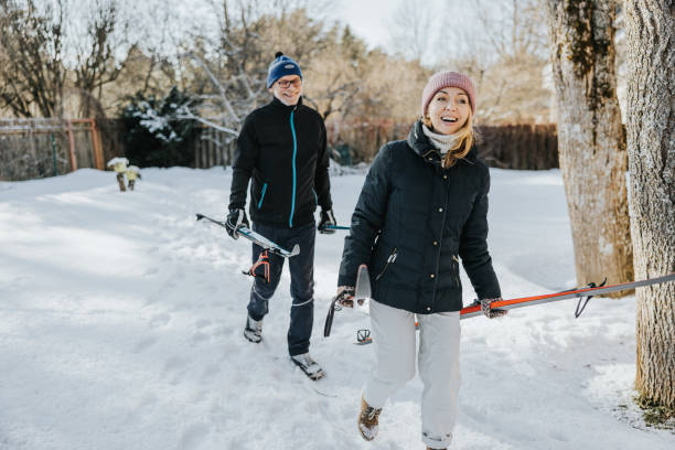 istock Father and daughter going skiing together 1377422938