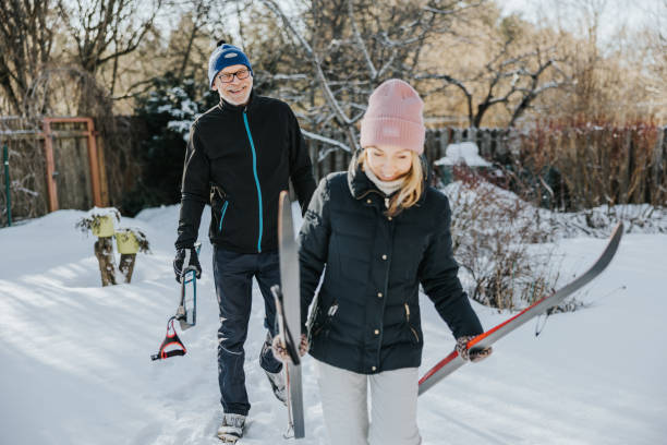 istock Father and daughter going skiing together 1377422939