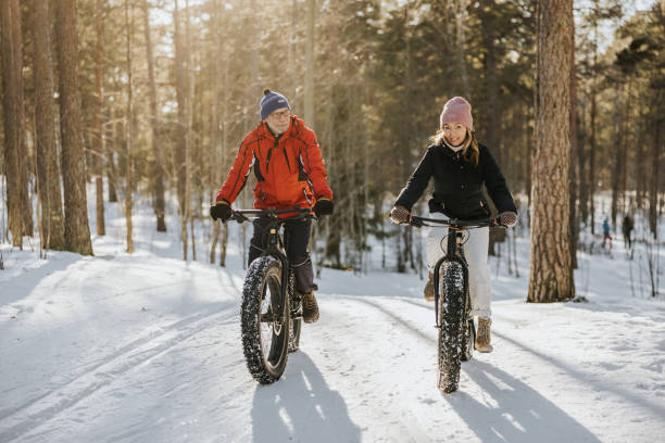 istock Father and daughter fatbiking in nature 1377423510