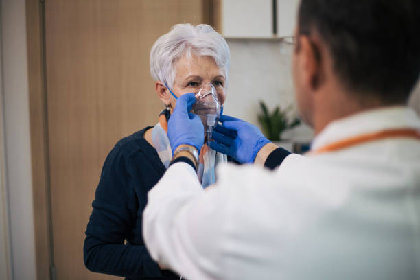 senior woman patient visit a doctor - respiratory system imagens e fotografias de stock