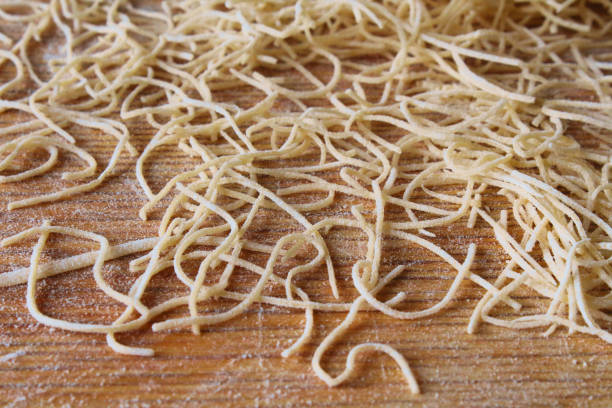 istock Dried thin homemade soup noodles. Close-up. Background. Texture. 1377453138