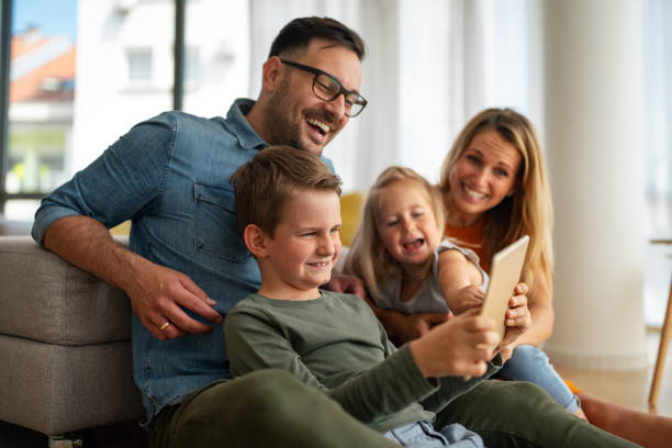 istock Happy family having fun and spending time together at home 1377458016