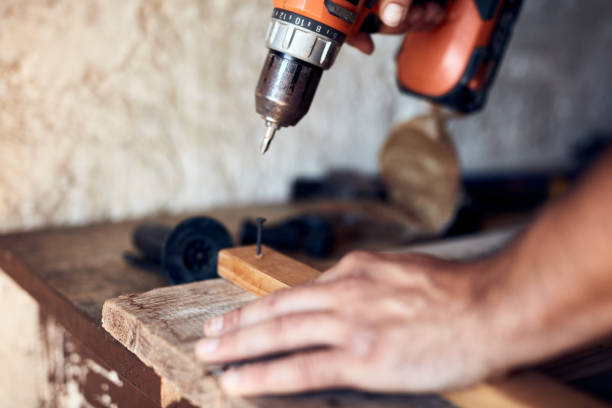 istock Man assembling furniture and fixing it - hobby concept. 1377508409