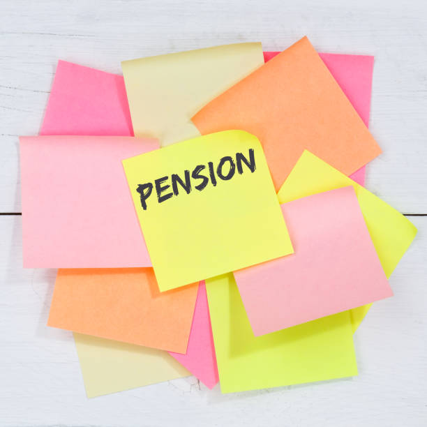 istock Pension retirement business concept desk note paper 1377526197