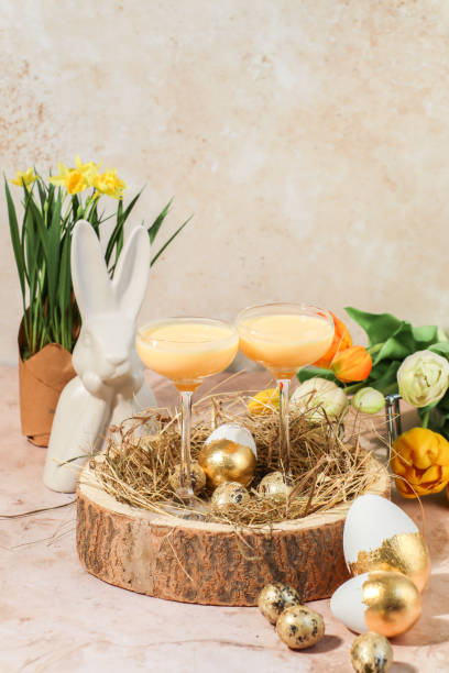 istock Creamy advocaat egg liqueur drink for Easter celebration in springtime with tulips 1377531083
