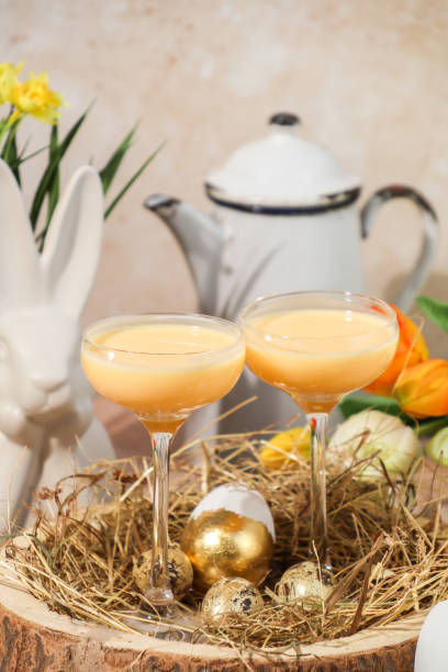 istock Creamy advocaat egg liqueur drink for Easter celebration in springtime with tulips 1377532728