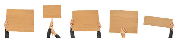 Posters of cardboard in his hands. Isolated on white. Set. Copy space.