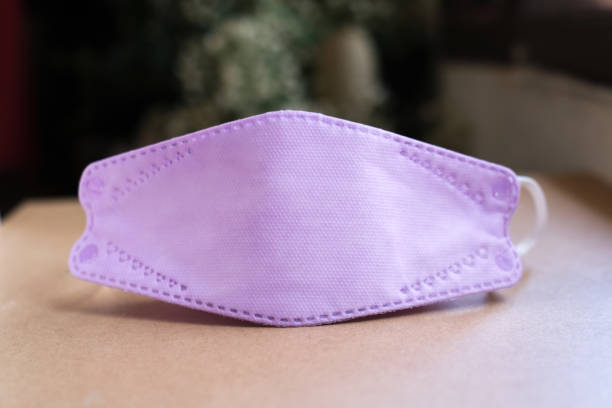 istock Purple anti-virus mask 1377667666